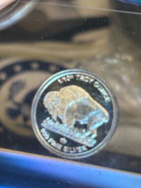Silver Buffalo Round Coin Displayed in Protective Sleeve